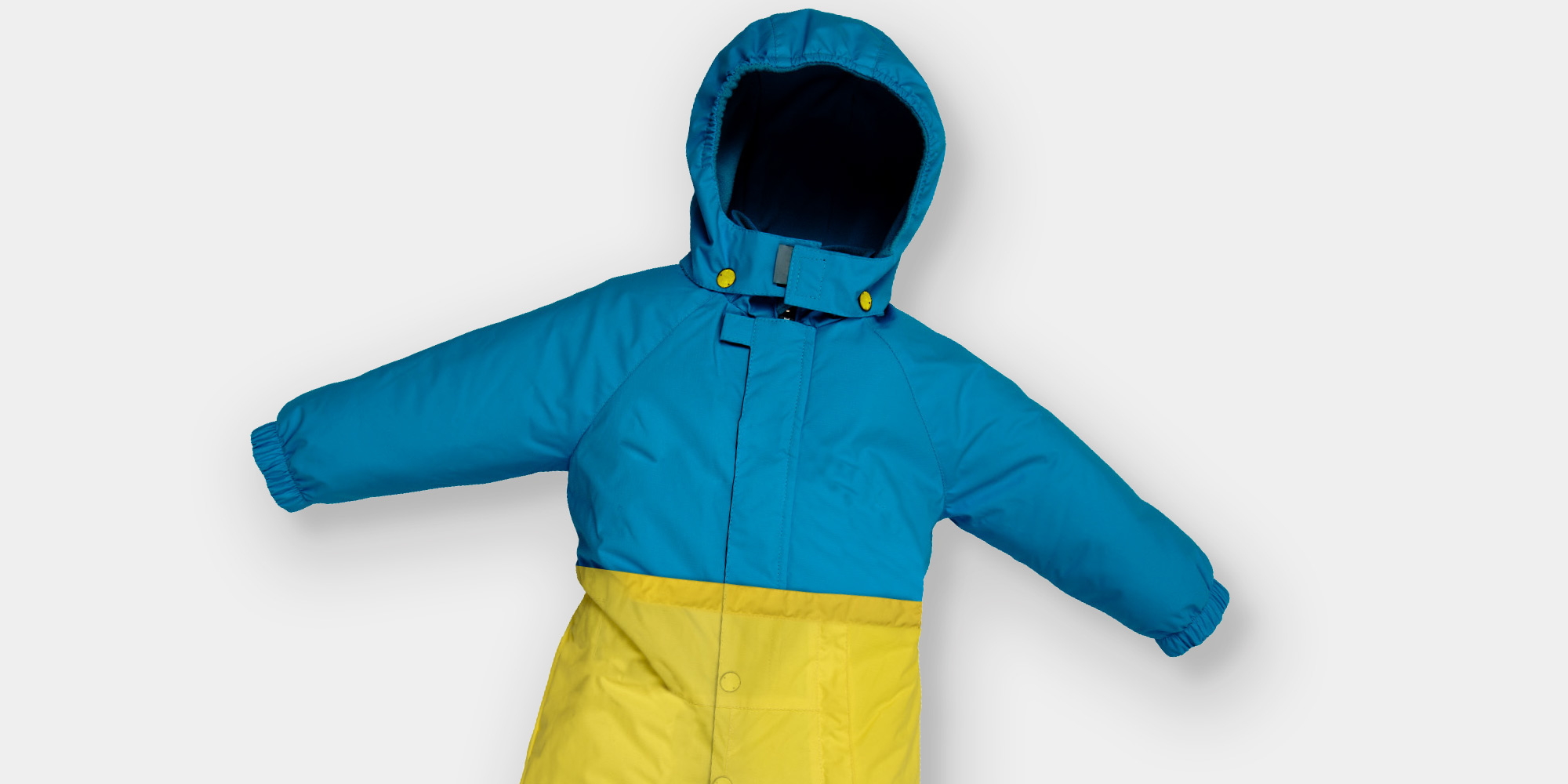 Flyverdragt i bl&aring; og gul